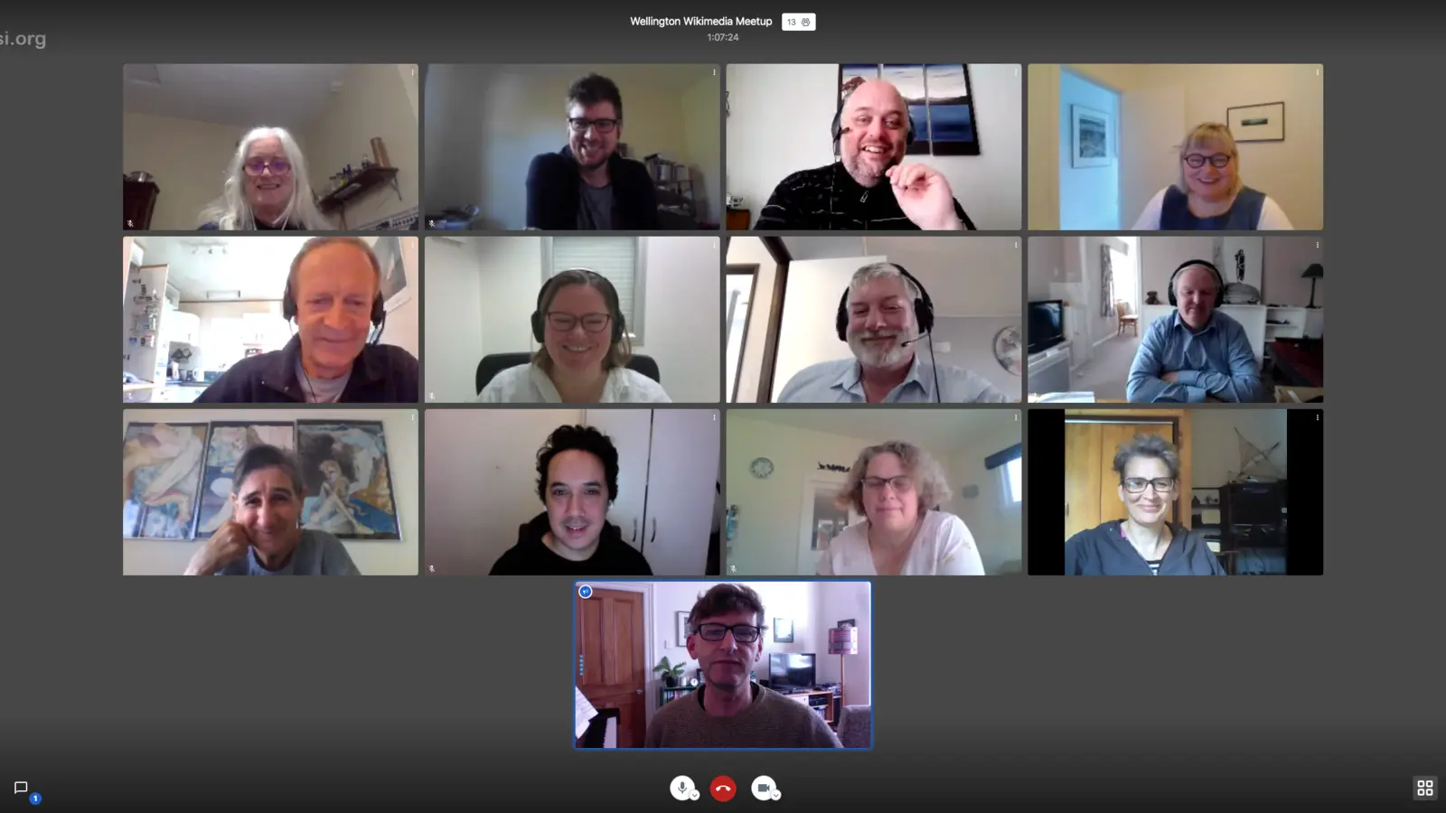 Tile-view meeting with thirteen participants