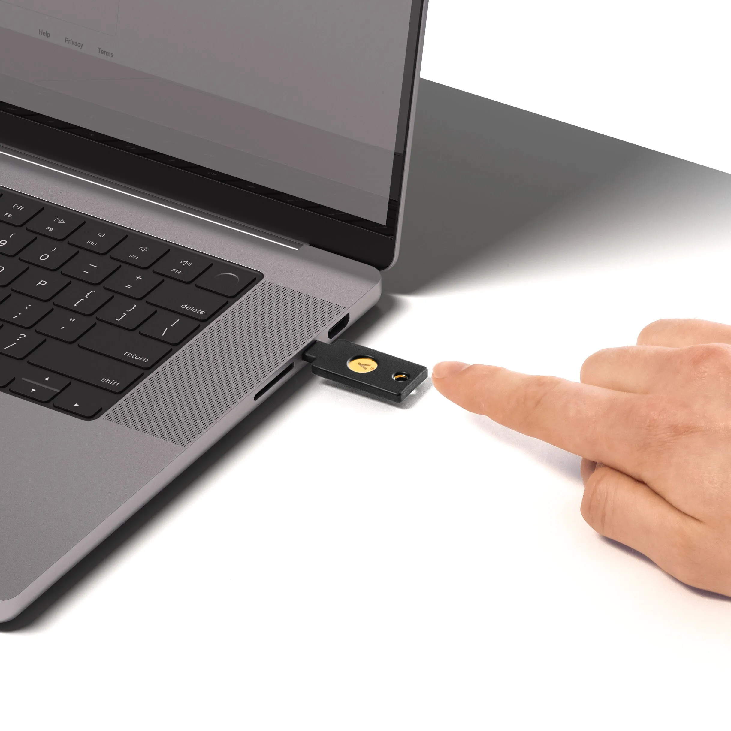 YubiKey 5C NFC — a USB-C security key roughly the size of a paperclip